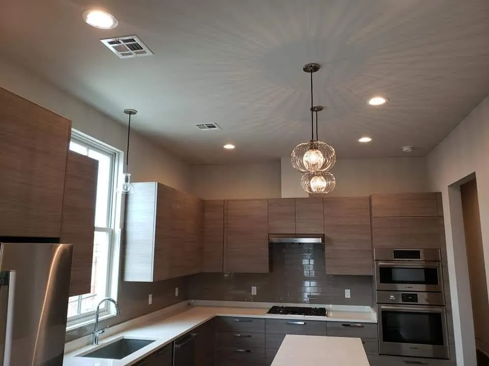 Kitchen pendants and recessed lights in a finished residential install